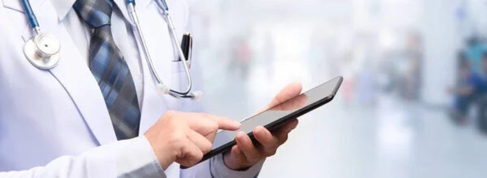 Depositphotos 233078118 stock photo smart woman doctor holding tablet